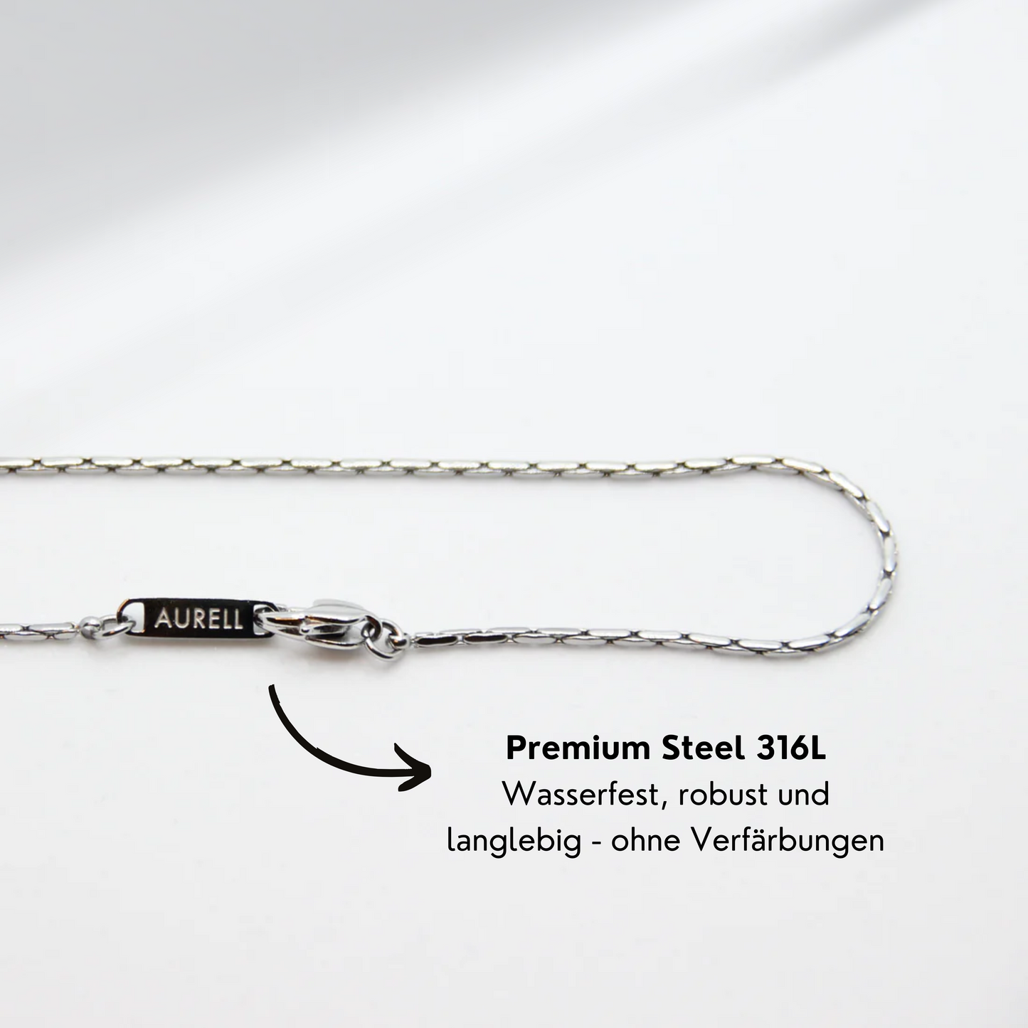 Edelstahl Armband, geflochten mit AURELL Logo auf weißem Hintergrund