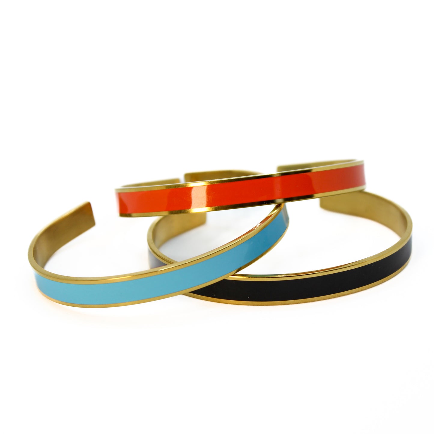 Armreif Schwarz Orange Blau Gold elegant auf weißem Hintergrund Damenschmuck