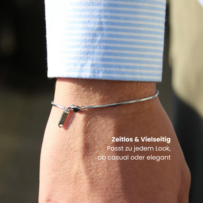 Edelstahl Armband, geflochten mit AURELL Logo an Handgelenk Herren