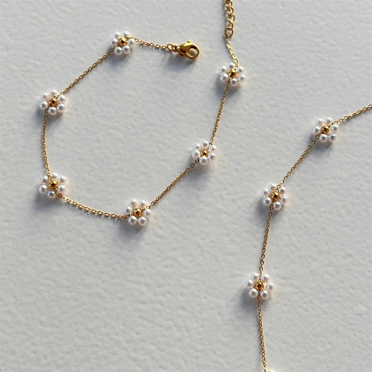 Perlenblumen-Halskette Armband