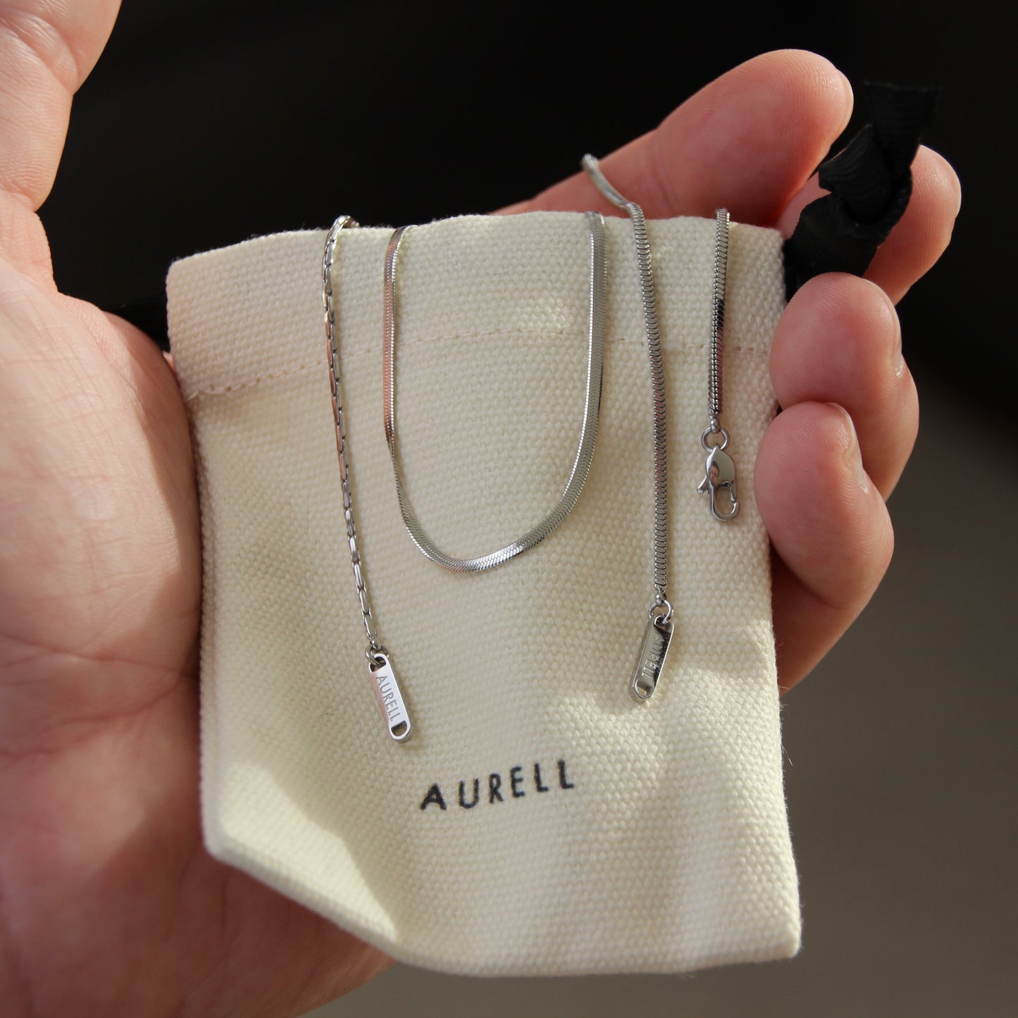 AURELL STATEMENT ARMBAND